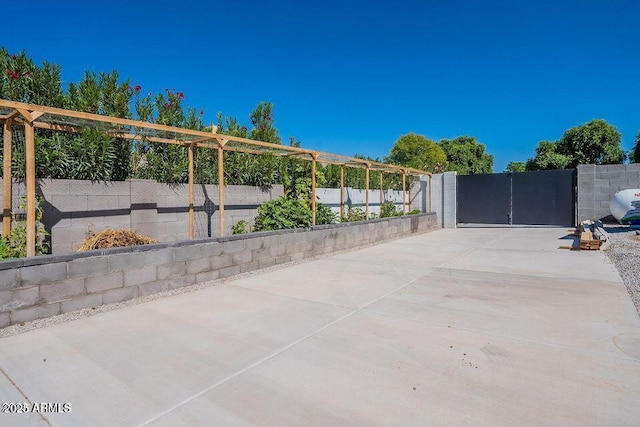 view of patio / terrace featuring a gate and a fenced backyard