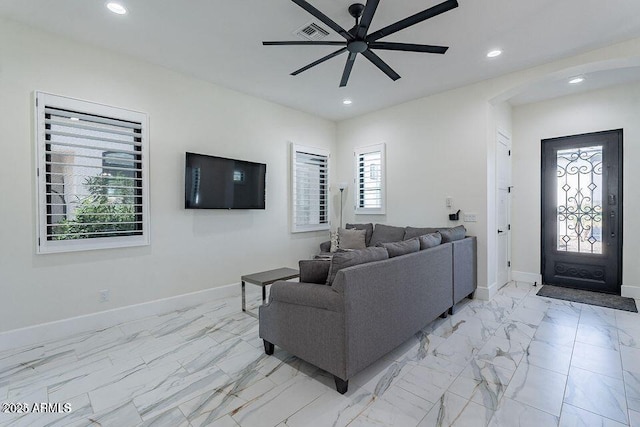 living room with marble finish floor, recessed lighting, visible vents, a ceiling fan, and baseboards