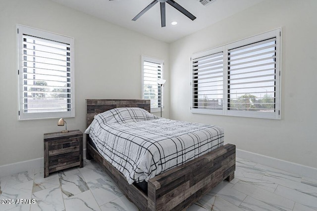 bedroom featuring recessed lighting, marble finish floor, visible vents, and baseboards