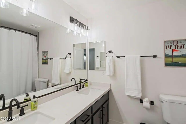 29228 N 48th St, Cave Creek, AZ 85331 - full bathroom featuring double vanity, a sink, and toilet