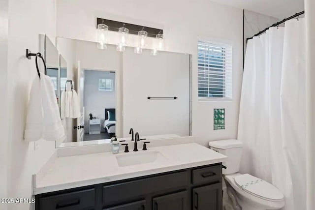 29228 N 48th St, Cave Creek, AZ 85331 - bathroom featuring connected bathroom, toilet, and a healthy amount of sunlight