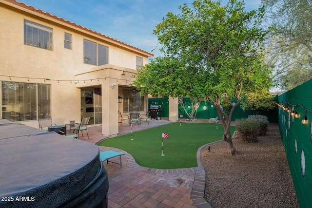 29228 N 48th St, Cave Creek, AZ 85331 - rear view of property featuring a tile roof, a fenced backyard, a patio area, and stucco siding