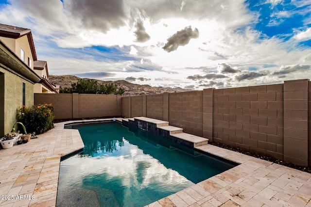 7712 S 37th Way, Phoenix, AZ 85042 - view of swimming pool with a fenced backyard, a patio area, and a mountain view