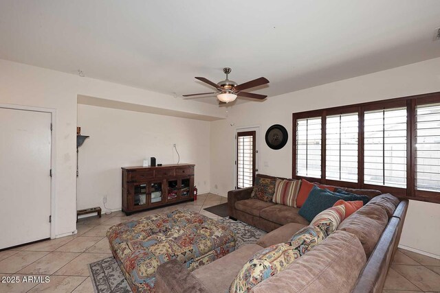 7712 S 37th Way, Phoenix, AZ 85042 - living area featuring light tile patterned floors and ceiling fan