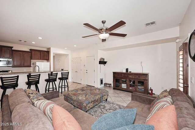7712 S 37th Way, Phoenix, AZ 85042 - living area featuring a ceiling fan, recessed lighting, and light tile patterned floors