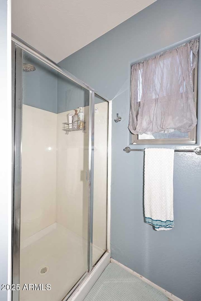 7712 S 37th Way, Phoenix, AZ 85042 - full bathroom with a shower stall and baseboards
