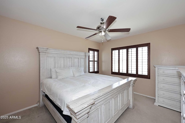 7712 S 37th Way, Phoenix, AZ 85042 - bedroom featuring light colored carpet, baseboards, and a ceiling fan