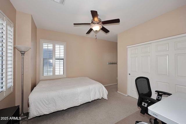 7712 S 37th Way, Phoenix, AZ 85042 - carpeted bedroom featuring a desk, baseboards, a closet, and a ceiling fan