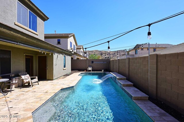 7712 S 37th Way, Phoenix, AZ 85042 - view of pool with a patio area and a fenced backyard