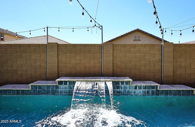 7712 S 37th Way, Phoenix, AZ 85042 - view of swimming pool with fence