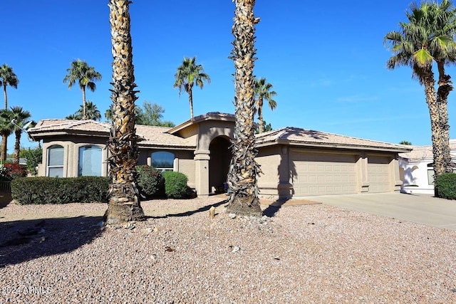 view of front of home with a garage