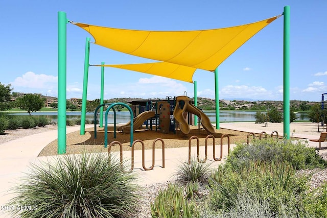 view of playground featuring a water view