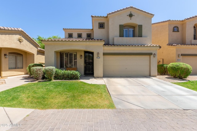 2043 W Periwinkle Way, Chandler, AZ 85248 - mediterranean / spanish-style home featuring stucco siding, a garage, driveway, and a tiled roof