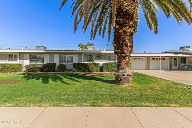10750 W Abbott Ave, Sun City, AZ 85351 - ranch-style house with a garage, a front yard, and concrete driveway