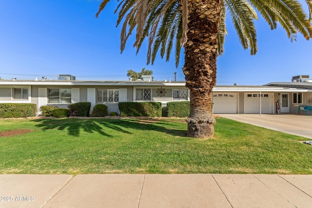 ranch-style house with a garage, a front yard, and concrete driveway