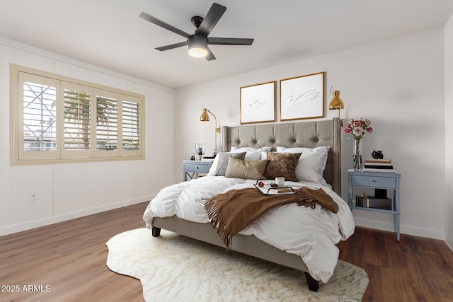 10750 W Abbott Ave, Sun City, AZ 85351 - bedroom featuring ceiling fan, wood finished floors, and baseboards