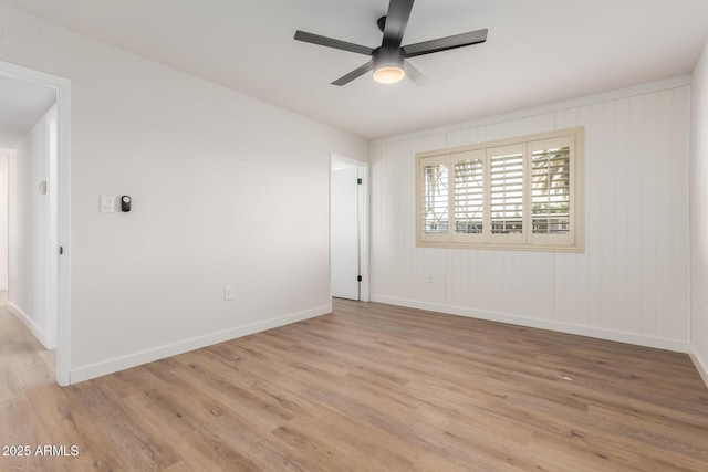 10750 W Abbott Ave, Sun City, AZ 85351 - spare room featuring a ceiling fan, baseboards, and light wood finished floors