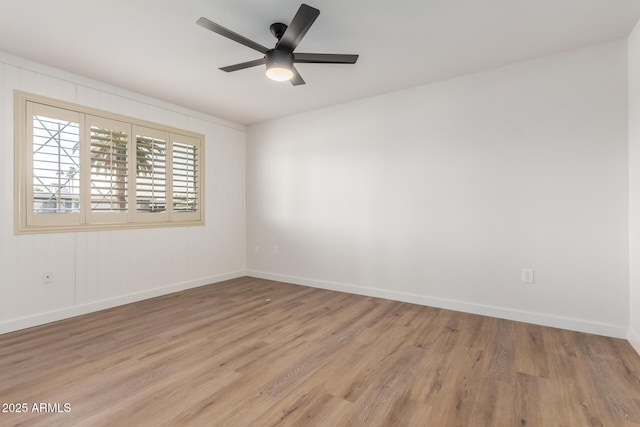 10750 W Abbott Ave, Sun City, AZ 85351 - unfurnished room featuring light wood-style flooring, baseboards, and ceiling fan