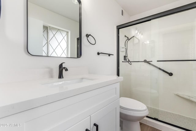 10750 W Abbott Ave, Sun City, AZ 85351 - full bath featuring vanity, a shower stall, and toilet