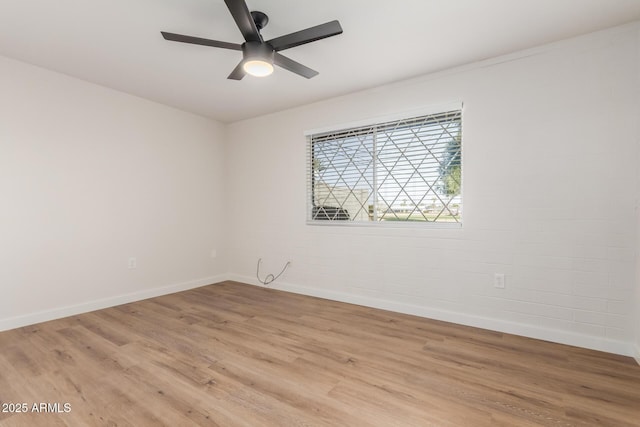 10750 W Abbott Ave, Sun City, AZ 85351 - unfurnished room with ceiling fan, light wood-type flooring, and baseboards