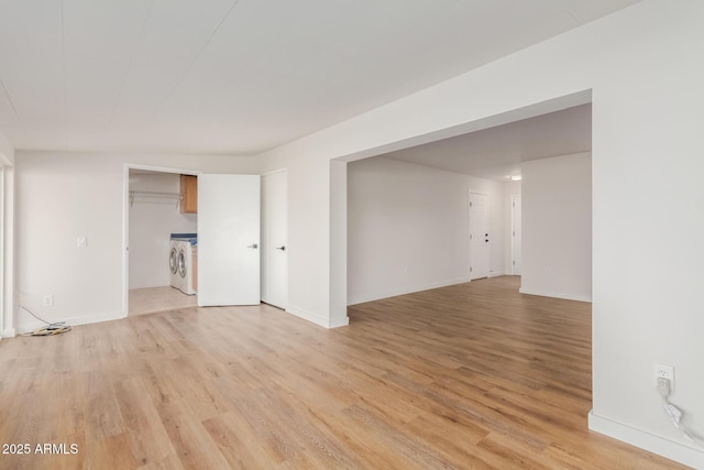 10750 W Abbott Ave, Sun City, AZ 85351 - empty room featuring light wood-style flooring and baseboards