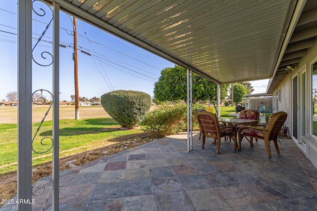 10750 W Abbott Ave, Sun City, AZ 85351 - view of patio featuring outdoor dining space