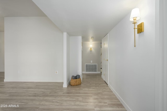 hallway featuring light hardwood / wood-style floors