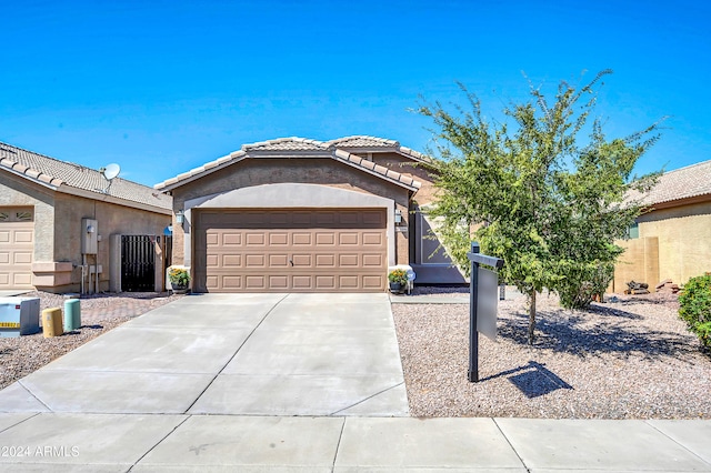 ranch-style home with a garage