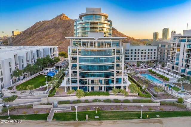 outdoor building at dusk featuring a mountain view