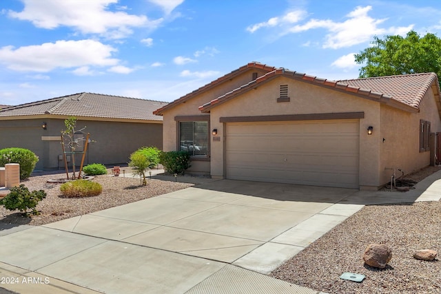 view of front of home with a garage