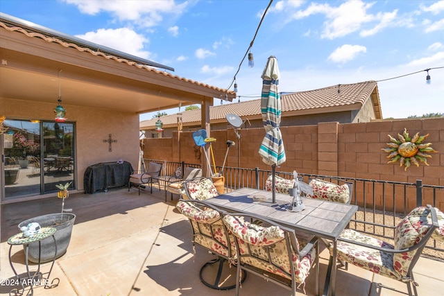 view of patio / terrace featuring a grill