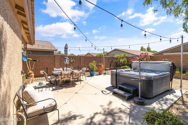 view of patio featuring a hot tub