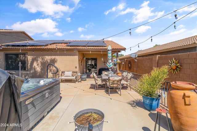 view of patio / terrace featuring a hot tub