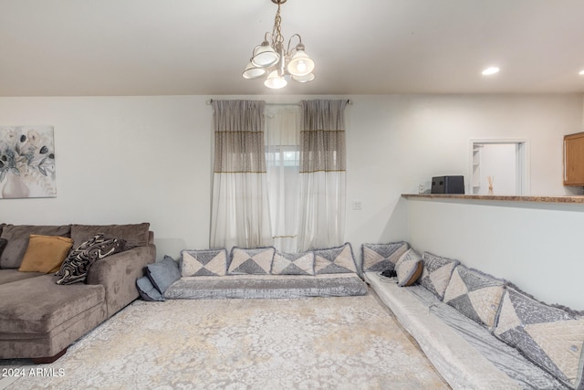 living room featuring a notable chandelier