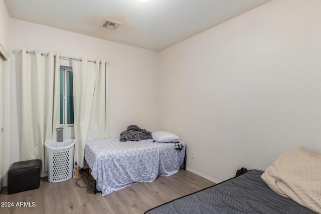 bedroom featuring light hardwood / wood-style floors