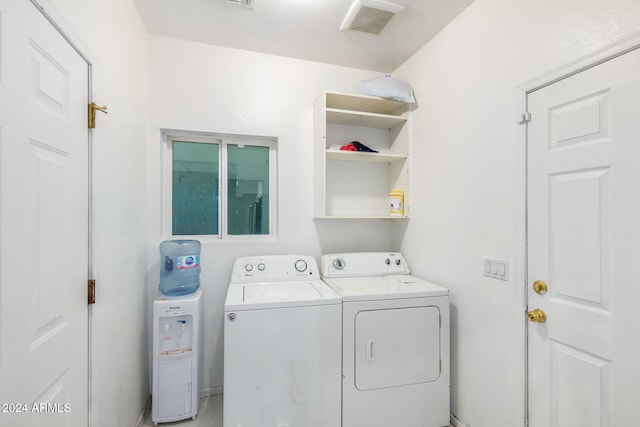 laundry room with washer and dryer