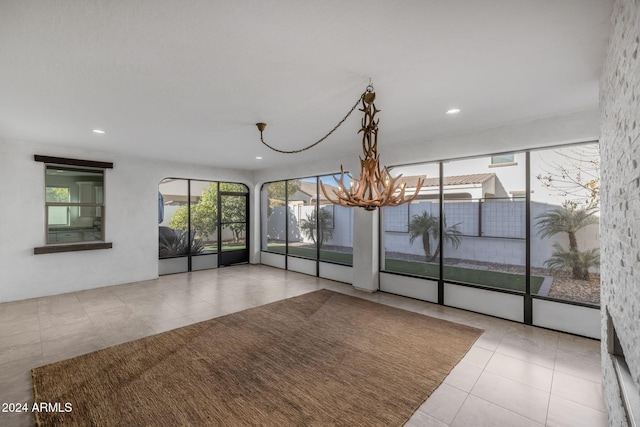 interior space featuring a chandelier