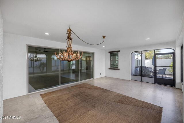 interior space with a notable chandelier