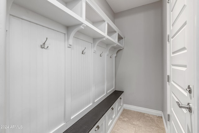 mudroom featuring light tile patterned floors