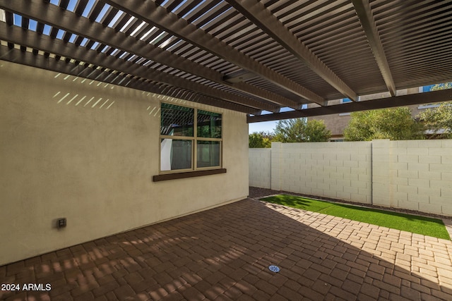 view of patio featuring a pergola