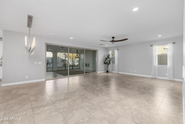 spare room with ceiling fan