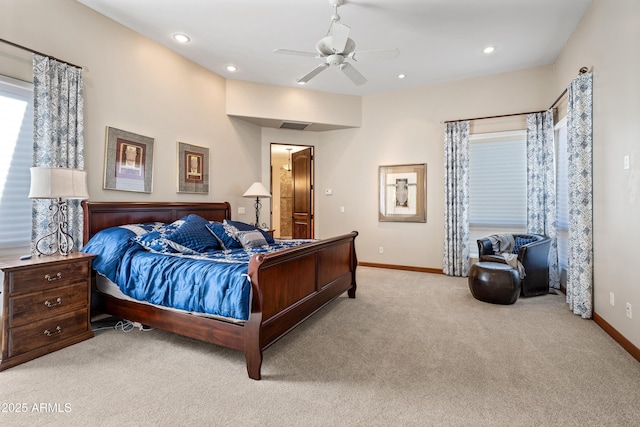 bedroom featuring light carpet and ceiling fan