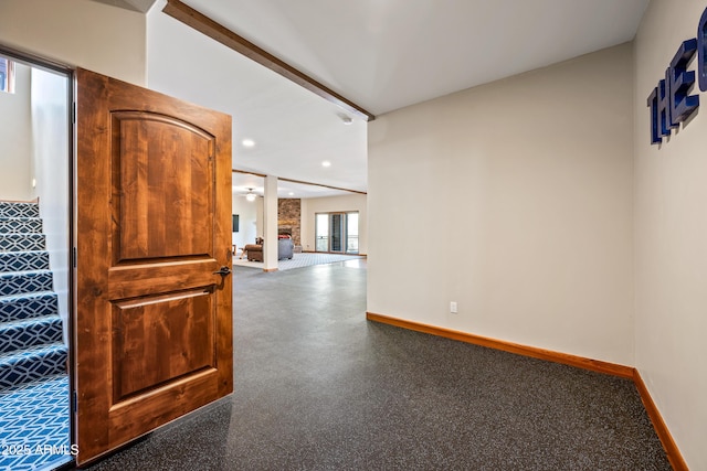 interior space with a large fireplace