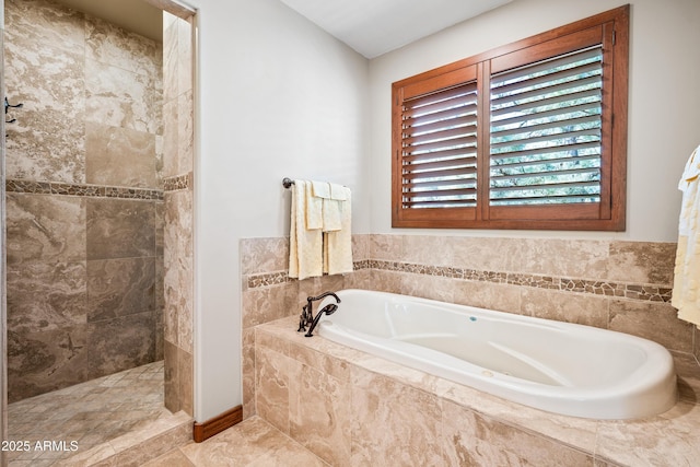 bathroom with separate shower and tub