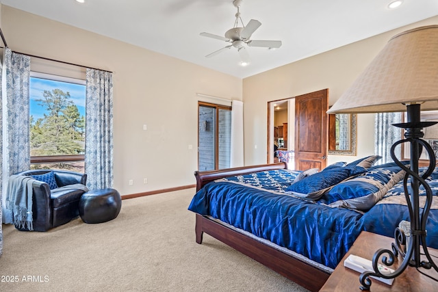 bedroom featuring multiple windows, ceiling fan, and carpet