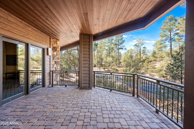 view of patio with a balcony