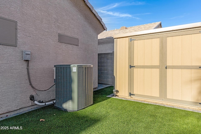 view of shed featuring central AC unit
