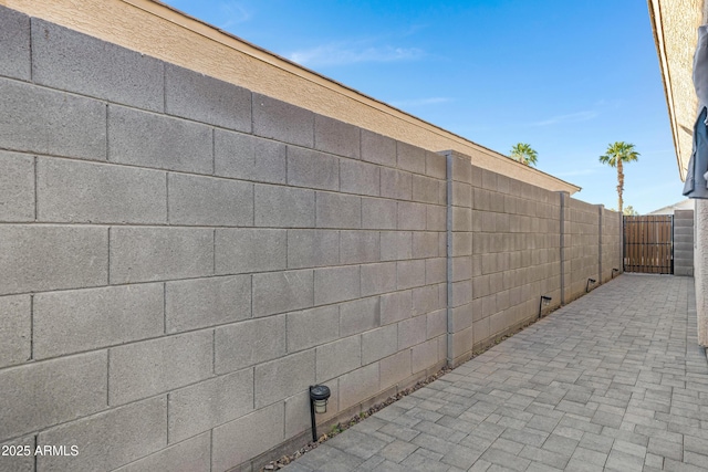 exterior space with a gate and fence