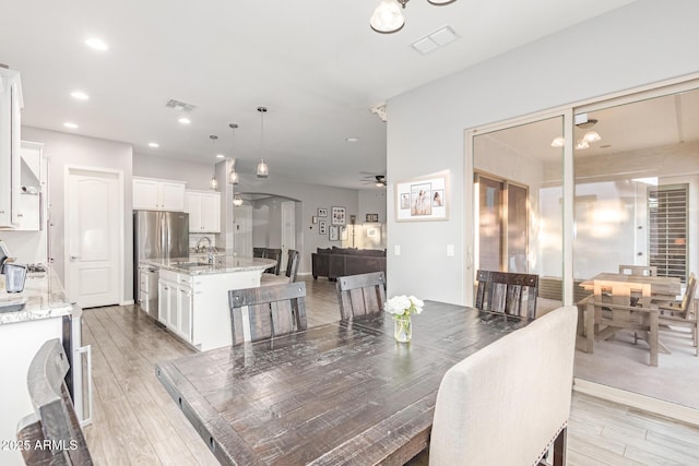 3884 S Wilson Dr, Chandler, AZ 85286 - dining area with ceiling fan, light wood-type flooring, and recessed lighting