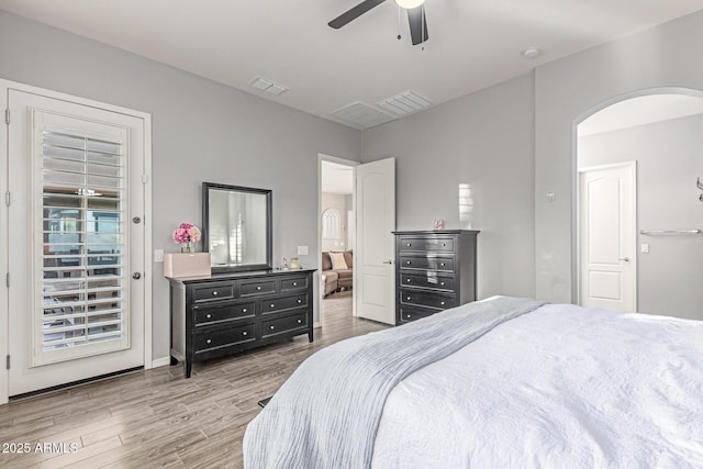 3884 S Wilson Dr, Chandler, AZ 85286 - bedroom with wood finished floors, arched walkways, and ceiling fan